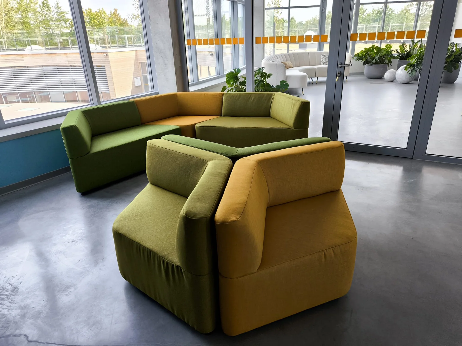 DZIEDZIC soft seating installed in a contract interior